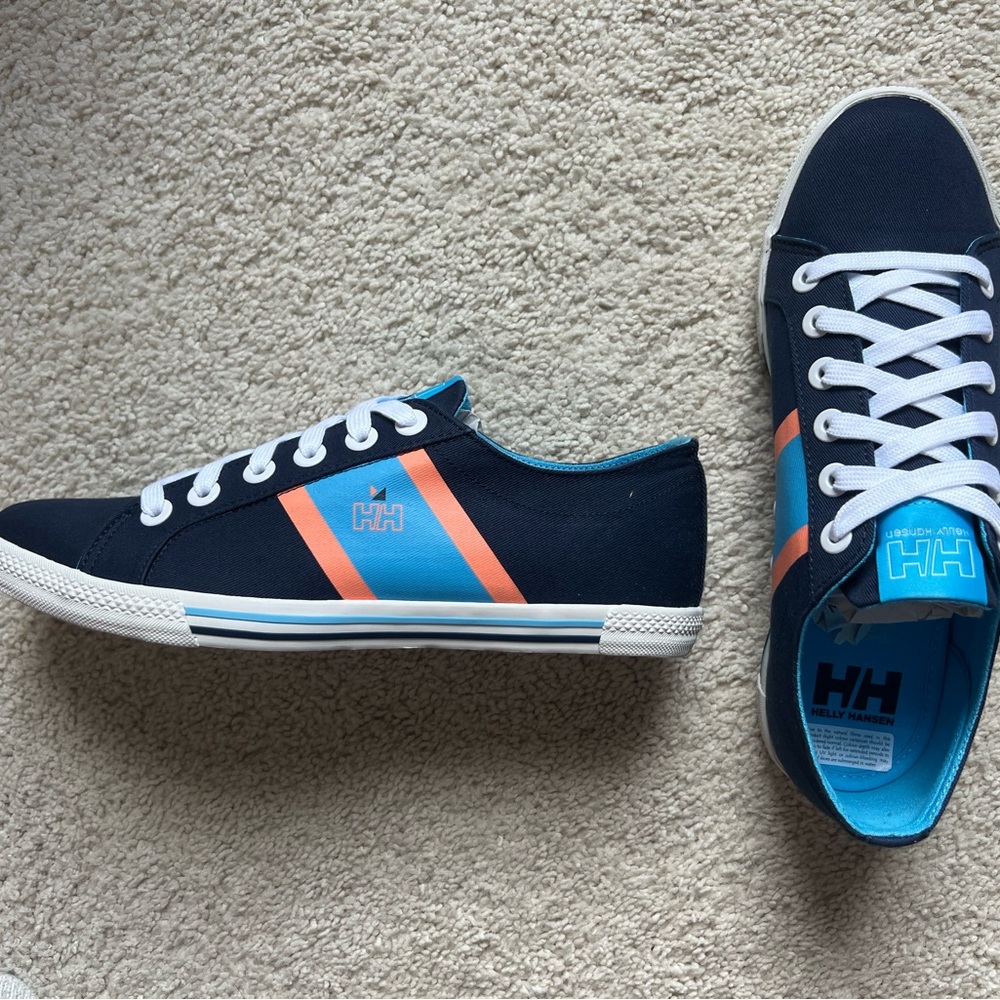 Brand new Helly Hansen navy canvas sneakers.  8.5
